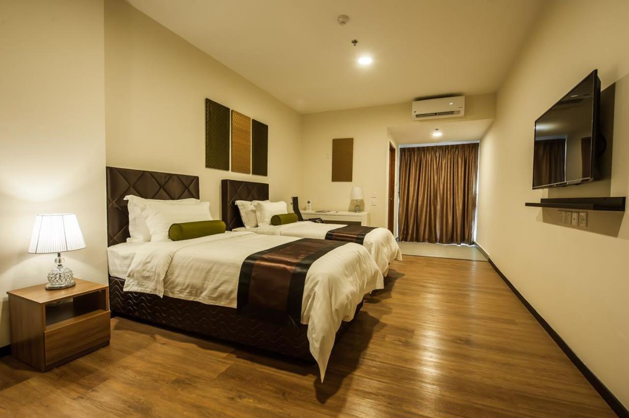 Aman Hills Hotel Kampong Timbunan Экстерьер фото